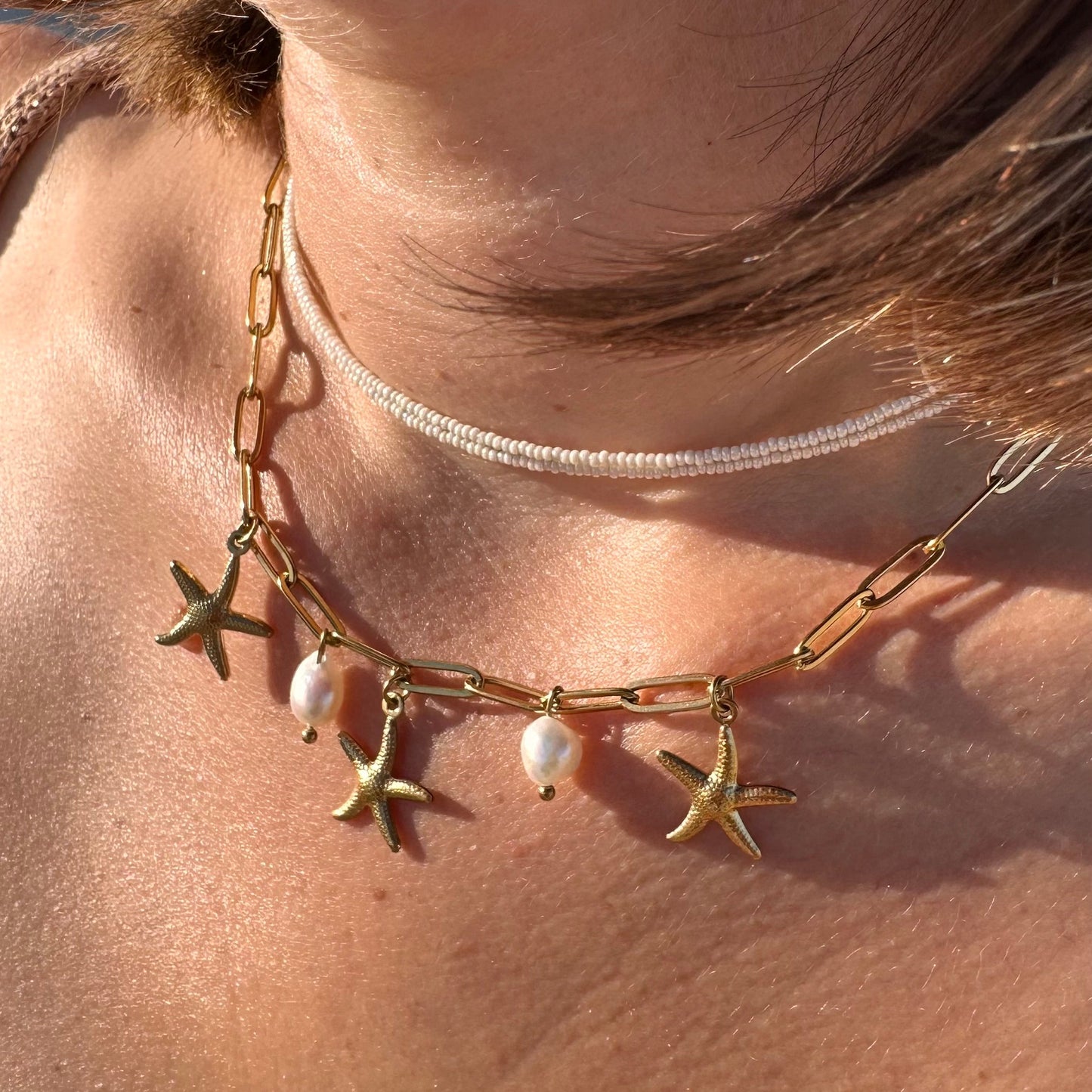 Collier breloques étoiles de mer
