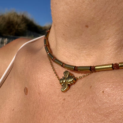 Collier perles tube