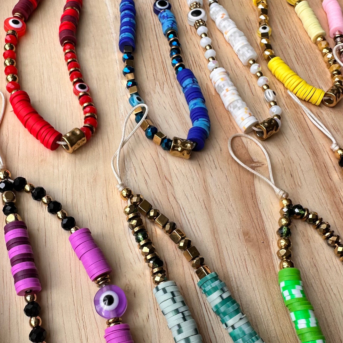 Grigri de téléphone cristal et oeil