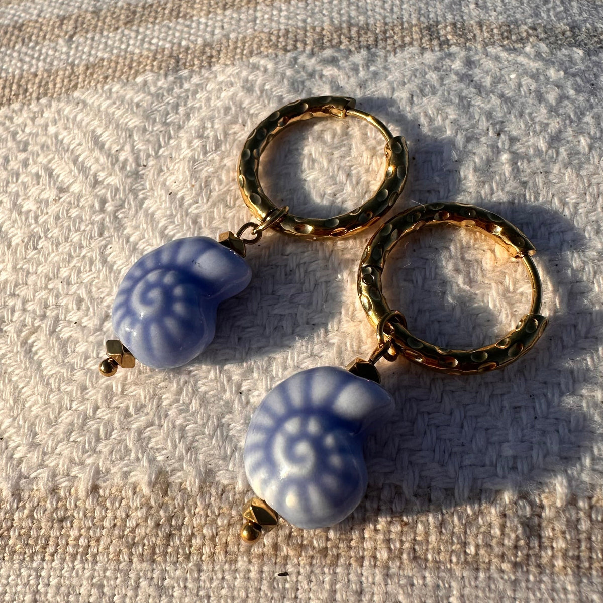Boucles escargot céramique