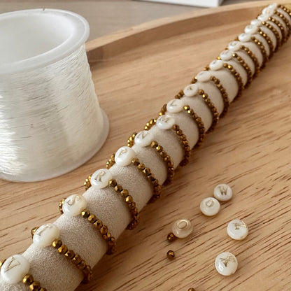 Bague perles alphabet