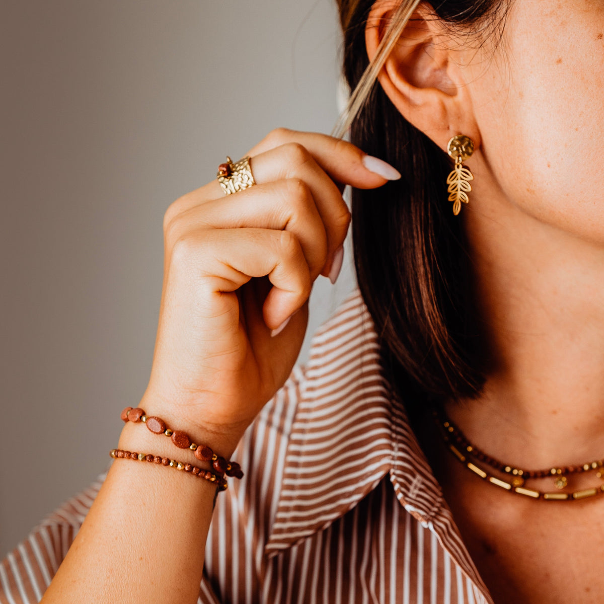 Collier tubes et perles goldstone