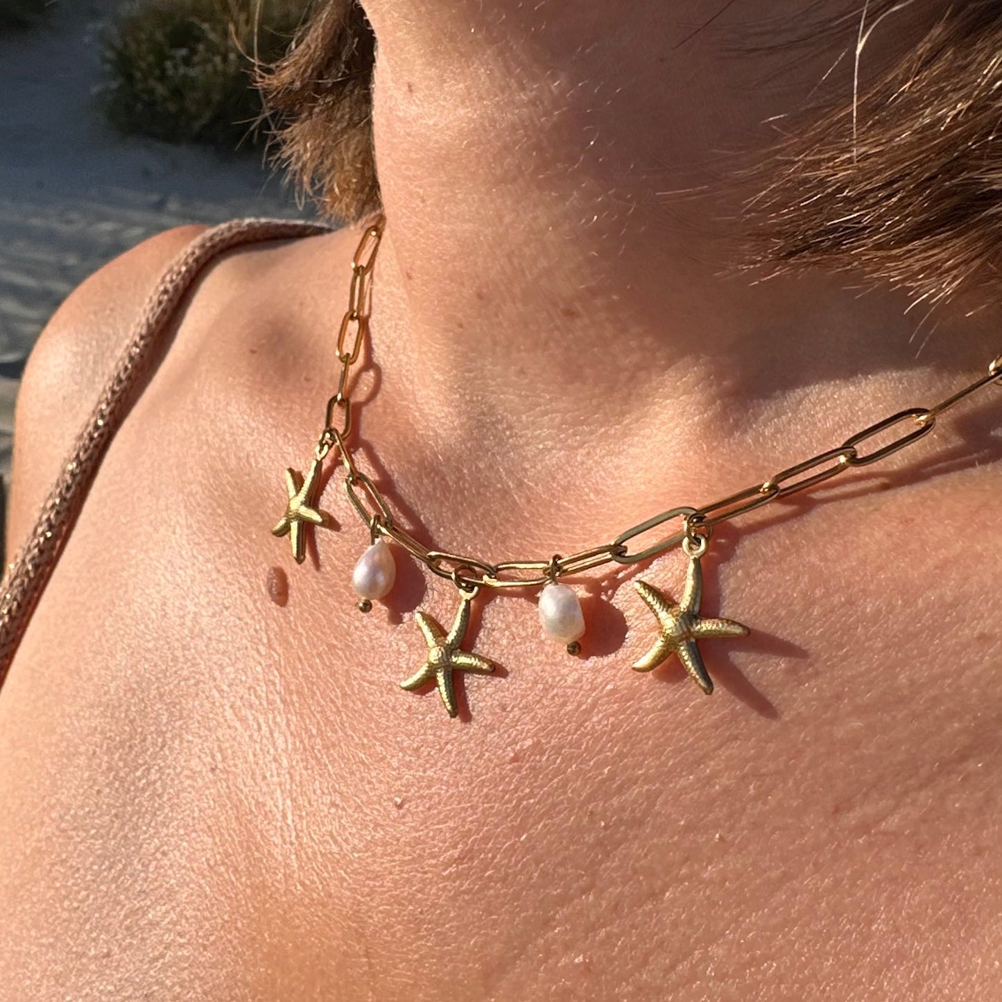 Collier breloques étoiles de mer