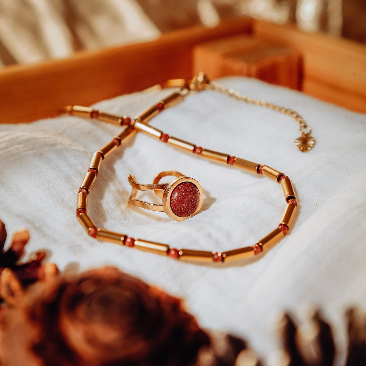 Collier tubes et perles goldstone